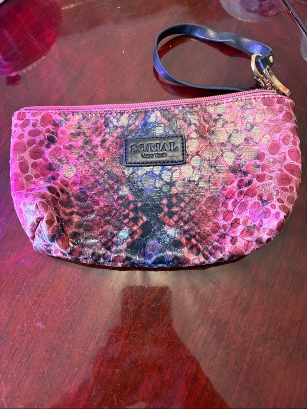 Pink Snake-Embossed Wristlet Clutch